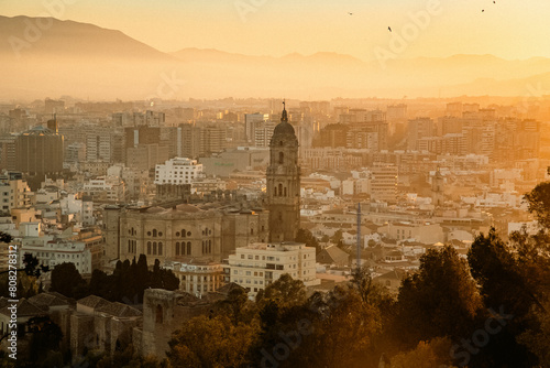 view over Malaga at sunset travel banner