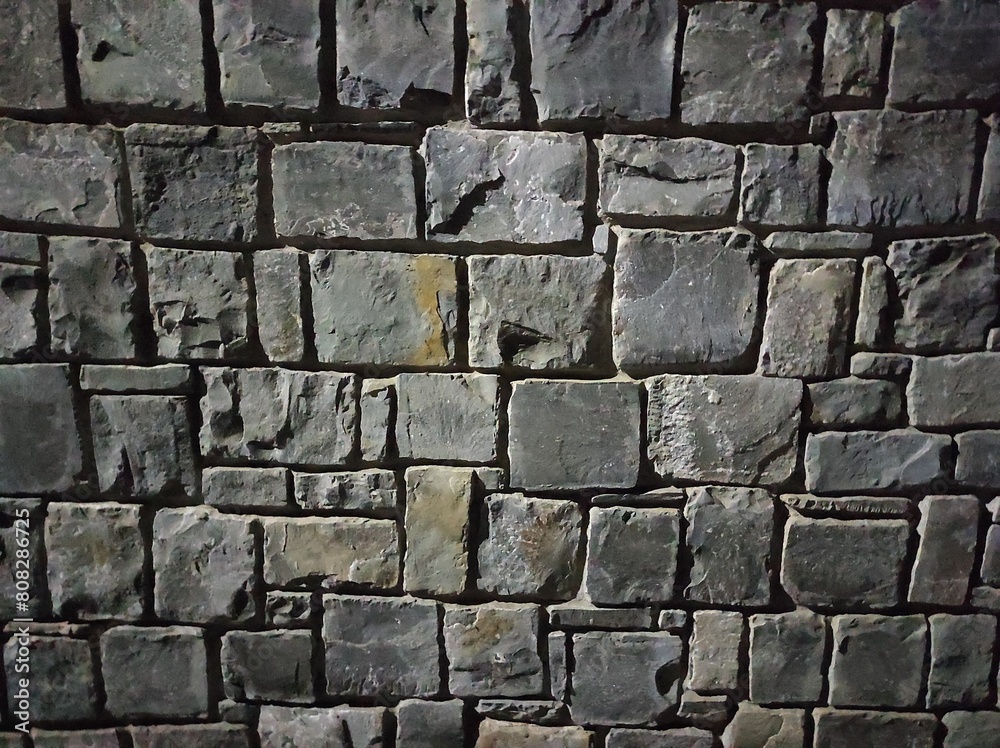 Photo of natural stone texture. Texture of the wall made of natural stone Photo of natural stone texture. Texture of the wall made of natural stone