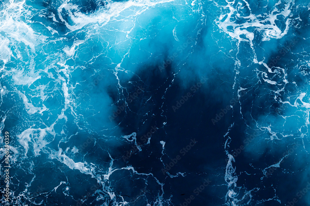 Ocean water background with foam. Ocean water splash. Not a calm Ocean water background with foam. Ocean water splash. Not a calm