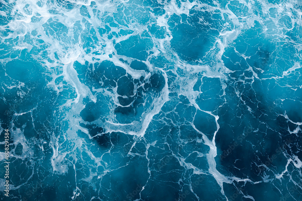 Ocean water background with foam. Ocean water splash. Not a calm Ocean water background with foam. Ocean water splash. Not a calm