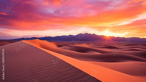 Panoramic view of the sand dunes in the desert at sunset