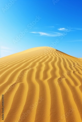 Stunning desert landscape vivid blue sky contrasting with the radiant yellow sand