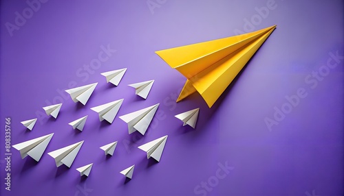 collection of paper airplanes displayed against vibrant purple backdrop leadership concept