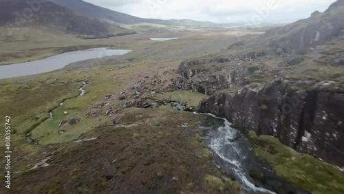 areal fpv footage of mountain rivers and lakes in Ireland, Conor pass Ireland in cloudy day  photo