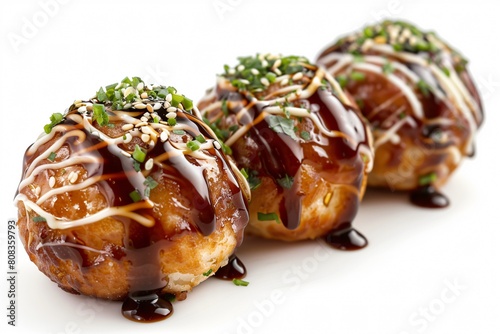 tasty takoyaki with sesame seeds on white background photo