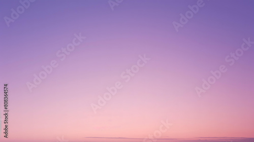 Serene sky with a soft gradient from purple to pink  reminiscent of a peaceful sunset