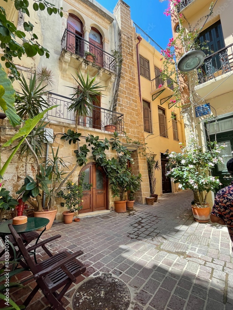 Obraz premium Beautiful old buildings, streets, stairs and alley ways in the town of Chania, Greece at 10 August 2023. High quality photo