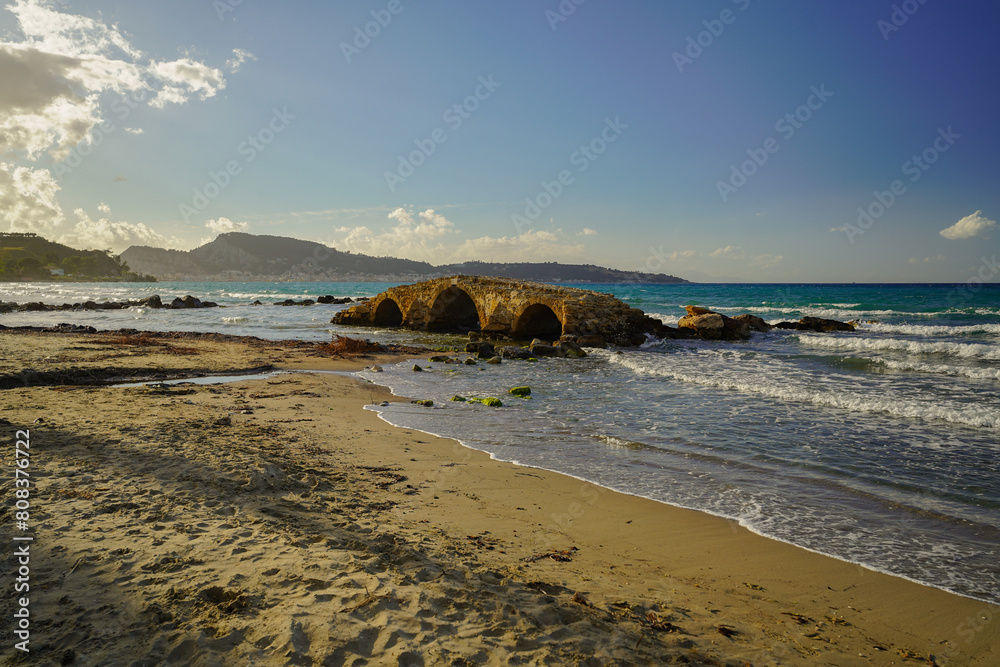 ancient stone bridge in Argassi beach in Zakinthos , Greece ancient stone bridge in Argassi beach in Zakinthos , Greece