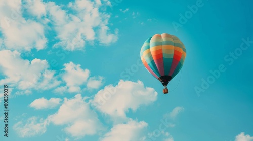 Colorful Hot Air Balloon Drifting in Blue Sky