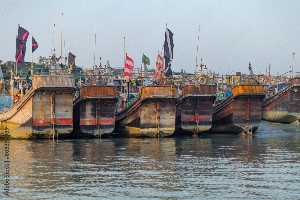 Port of Chittagong traditional cargo and fishing boats on the water