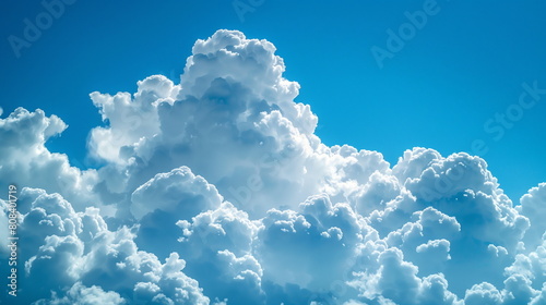 Majestic Cumulus Clouds Against a Brilliant Azure Sky: Ideal for Weather Forecasts and Nature Backgrounds