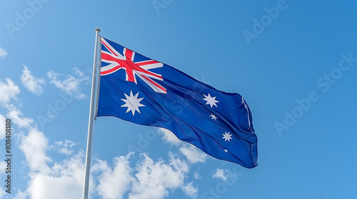 Australian Flag Waving Under Blue Sky, National Pride of Australia photo