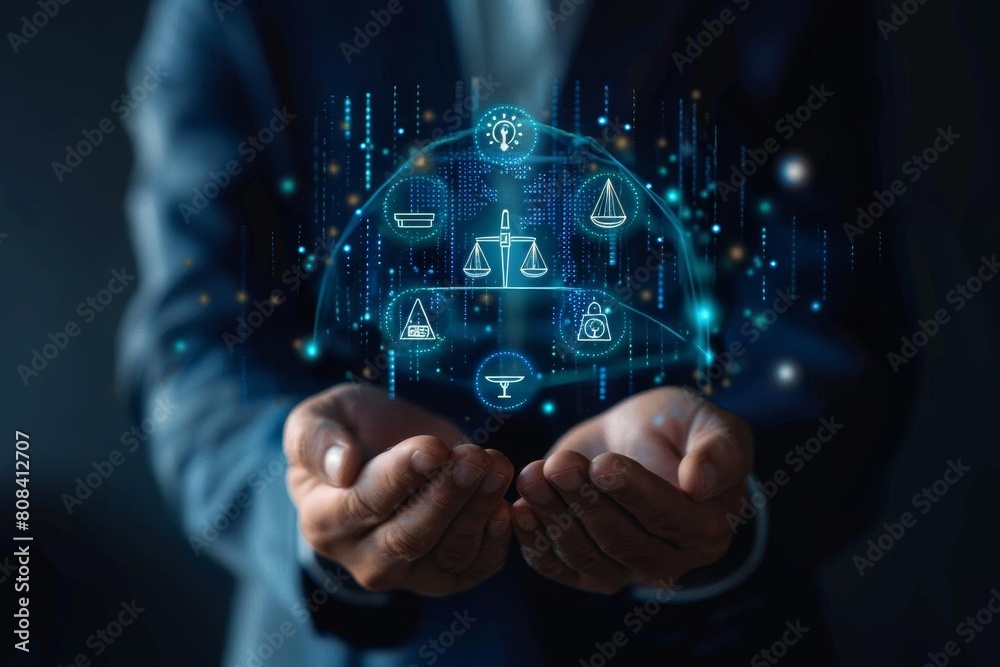 A businessman holds a hologram with icons related to ethical business practices A businessman holds a hologram with icons related to ethical business practices