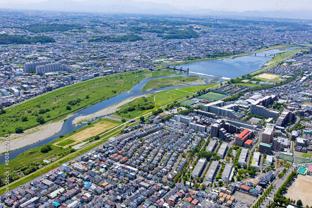 Φωτογραφία 郊外の住宅地と多摩川・多摩川緑地