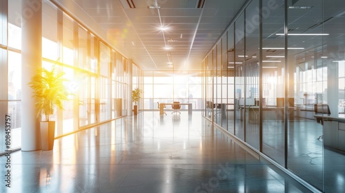 The open space of the office is empty and dim. Abstract light effect on interior background