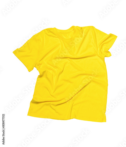 A crumpled yellow T-shirt isolated on a white background.