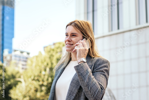 Businesswoman in suit talking on the phone