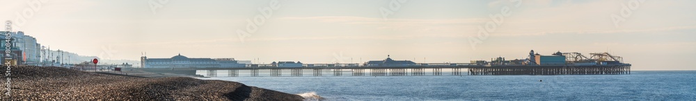 Panoramic view of the Brighton Pier in morning light. England Panoramic view of the Brighton Pier in morning light. England