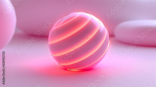 A pink ball with a spiral design is lit up in a pink background © hakule