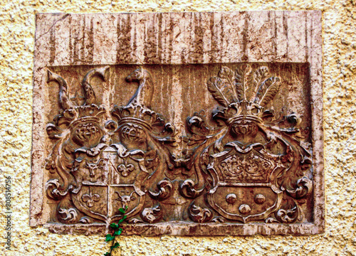 One of coats of arms of the former owners of the castle on the outer wall of Konopiste Castle in the Czech Republic