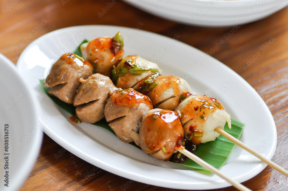 meatball and porkball or roasted meatball , grilled meatball or meatball satay meatball and porkball or roasted meatball , grilled meatball or meatball satay
