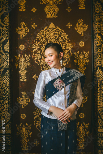 Lao girls dress in traditional Lao clothes. Beautiful Lao girl in Lao dress Asian woman wearing traditional Lao culture