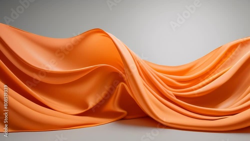 Flowing orange fabric with a silky texture creates an abstract and elegant visual with soft folds and gentle curves.
 photo