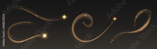 Magic gold star trail with glitter light dust. Golden shine glow wave with sparkle particle and twinkle on black background. Abstract stardust shimmer curve. Shiny glamour Christmas swirl motion