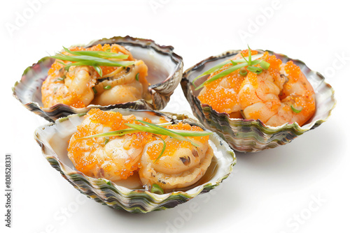 three clams with shrimp and oranges in a shell