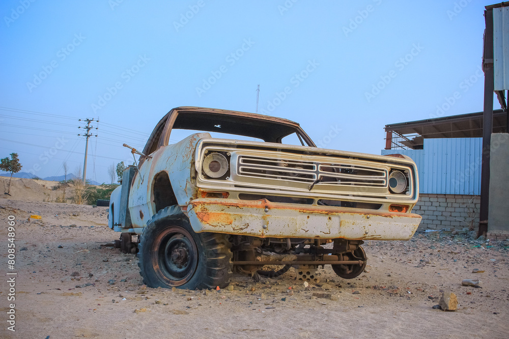 old abandoned car in desert