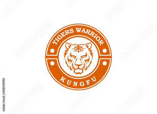 A bengal tiger face head with fangs and kung fu chinese lettering for Kungfu Club Martial Clan logo design