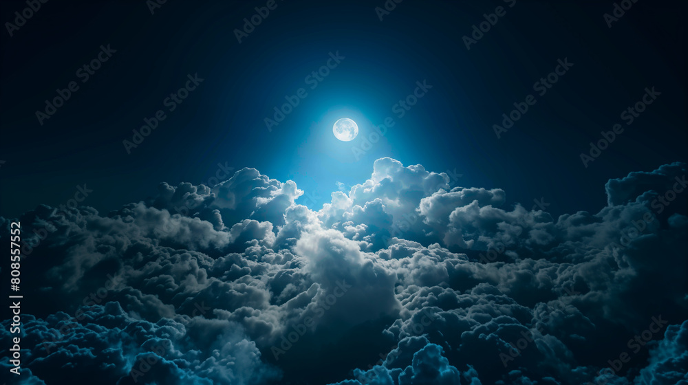 明るい月明かりの夜空と満月と雲