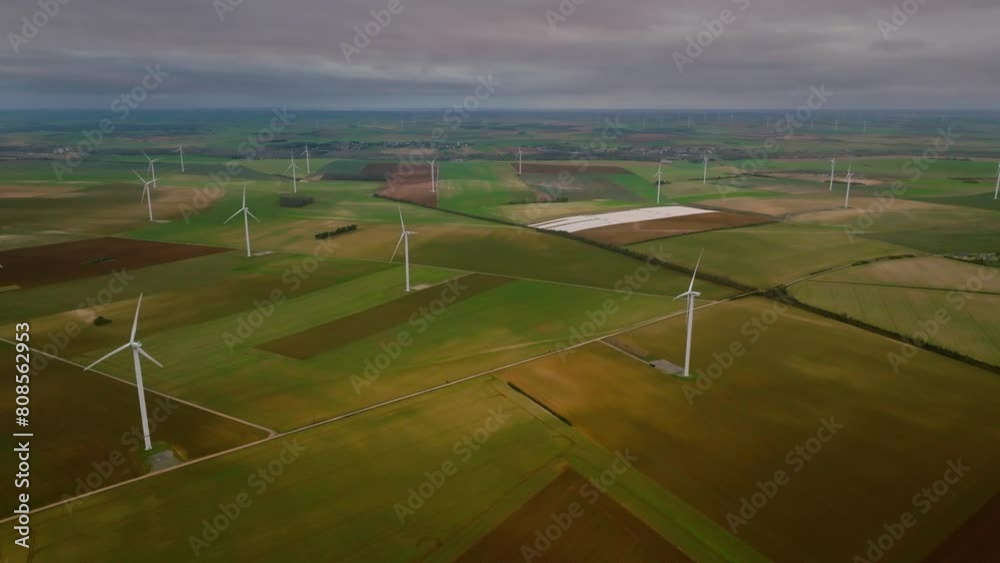 Wind turbine in the middle of a thunderstorm in France, worrying environment Wind turbine in the middle of a thunderstorm in France, worrying environment