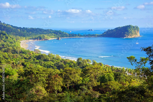Manuel Antonio national park beach and peninsula, Costa Rica, famous for the long white sand crescent-shaped beach