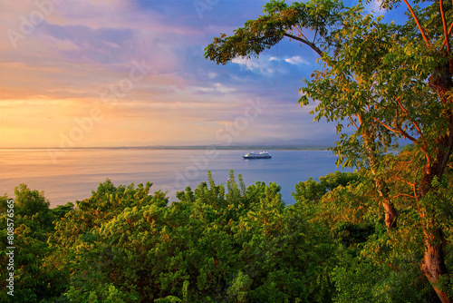 A cruise ship moors off Manuel Antonio National Park, Costa Rica, at sunset