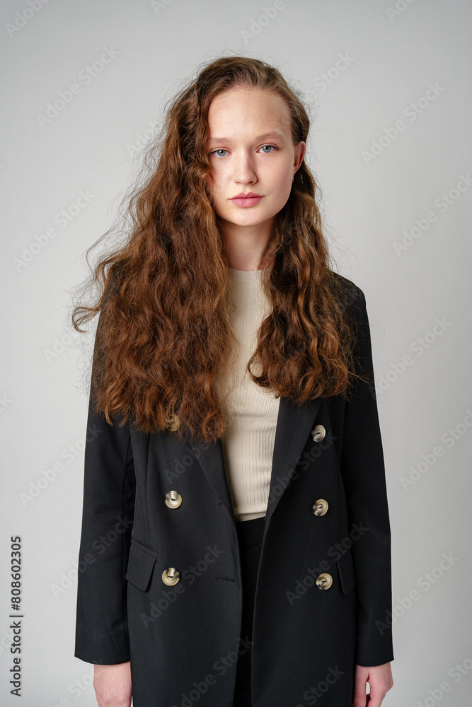 Woman With Long Hair and Blue Eyes on gray background Woman With Long Hair and Blue Eyes on gray background