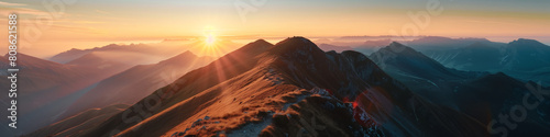 Majestic Sunrise Over Mountain Ridges photo