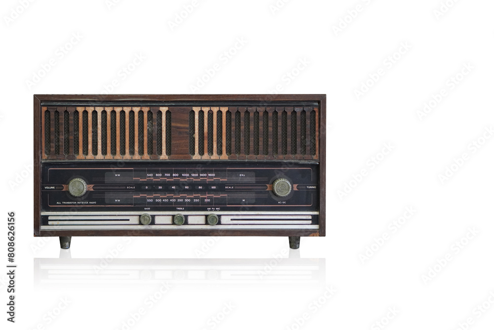 Fototapeta premium antique brown and black wooden radio on white background, technology, object, music, fashion, antique, dirty, copy space