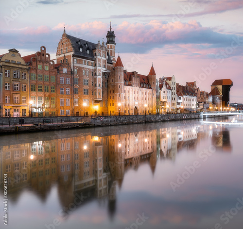 Twilight Reflections of Gdańsk's Old Town on the Motława Canal photo