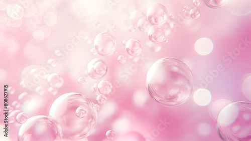 Abstract pink background with soap bubbles closeup and bokeh.
