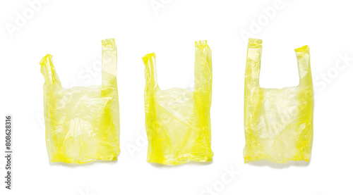 Set of Close up yellow plastic bags isolated on white background, cut out object, design element. Single-use polythene packet, Biodegradable packaging waste, Disposable bag, bag free day