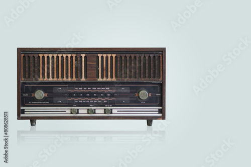 front view old brown wooden radio on green background, technology, object, music, fashion, antique, dirty, copy space