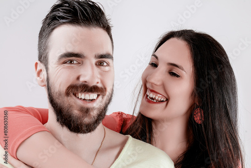 Joyful embrace, couple shares genuine laughter