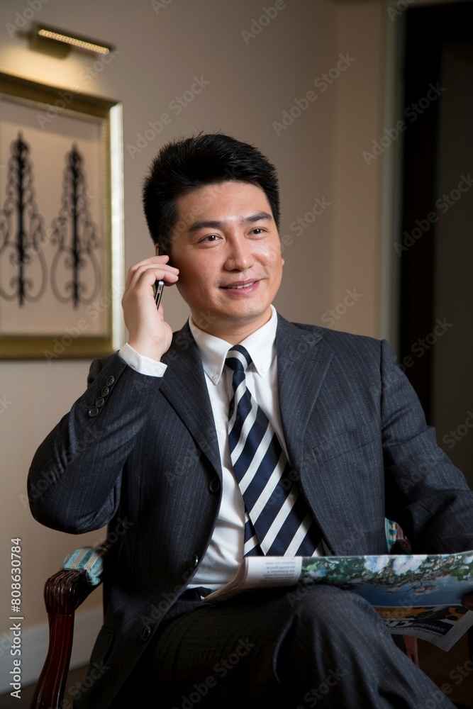Middle age business man read the newspaper in the study Middle age business man read the newspaper in the study