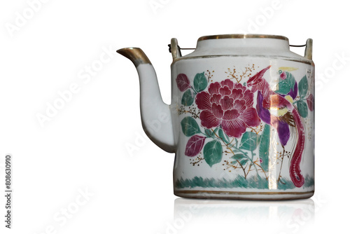 side view antique colorful and white ceramic teapot on gradient green and white background, object, vintage, decor, ancient, copy space