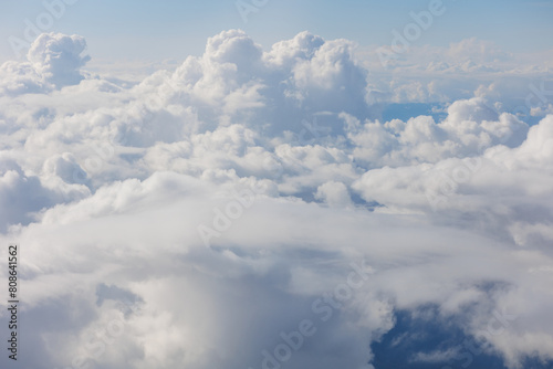 Fototapeta Naklejka Na Ścianę i Meble -  Aerial View Beauty white clouds on blue sky with soft sun light, Nature view fluffy clouds on pastel blue sky background