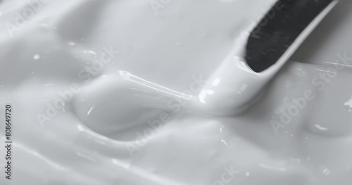 Motion of the Liquid cream, cosmetic texture , Top view. 
