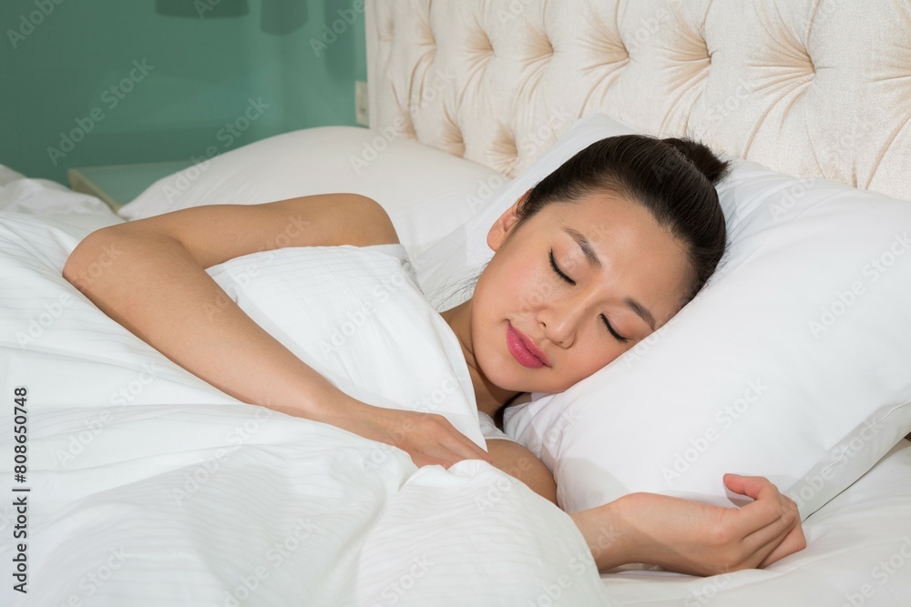 The young woman to rest in the bedroom The young woman to rest in the bedroom