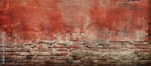 An image showing an aged brick wall with a red color providing ample space for additional elements