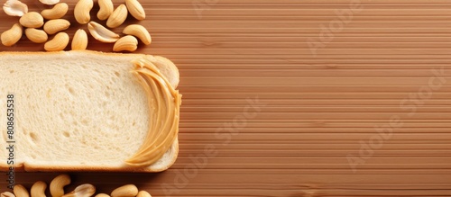The menu concept features a delectable peanut butter sandwich made with buttered bread or toast and nut butter It is presented on a food background with copy space viewed from the top